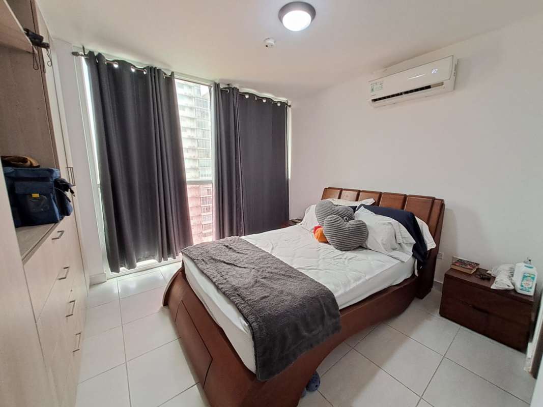 Bathroom with glass shower enclosure and modern tile finishes PH Carrasquilla Tower Panama
