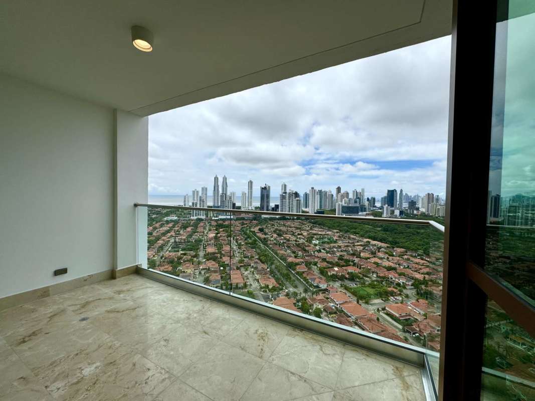 Expansive private terrace balcony overlooking golf course and Panama city skyline at PH The Colonial Santa Maria