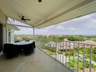 Master bedroom with king bed, ocean view and private terrace access in PH Puntarena Buenaventura