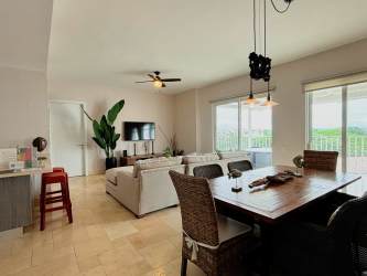 Spacious modern living and dining area with natural light in PH Puntarena Buenaventura