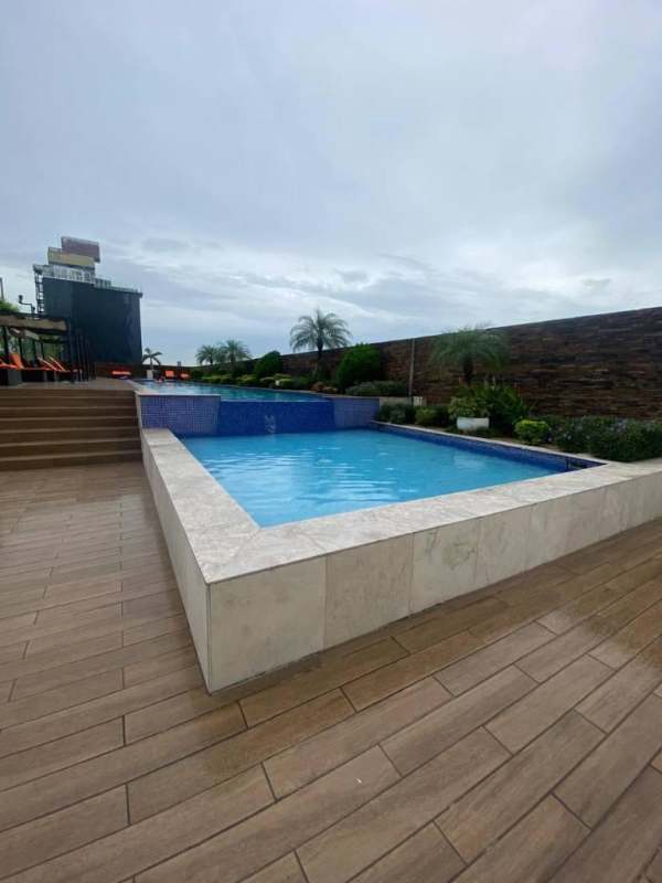 Infinity rooftop pool, lounge deck, panoramic ocean view at PH Rivage Panama