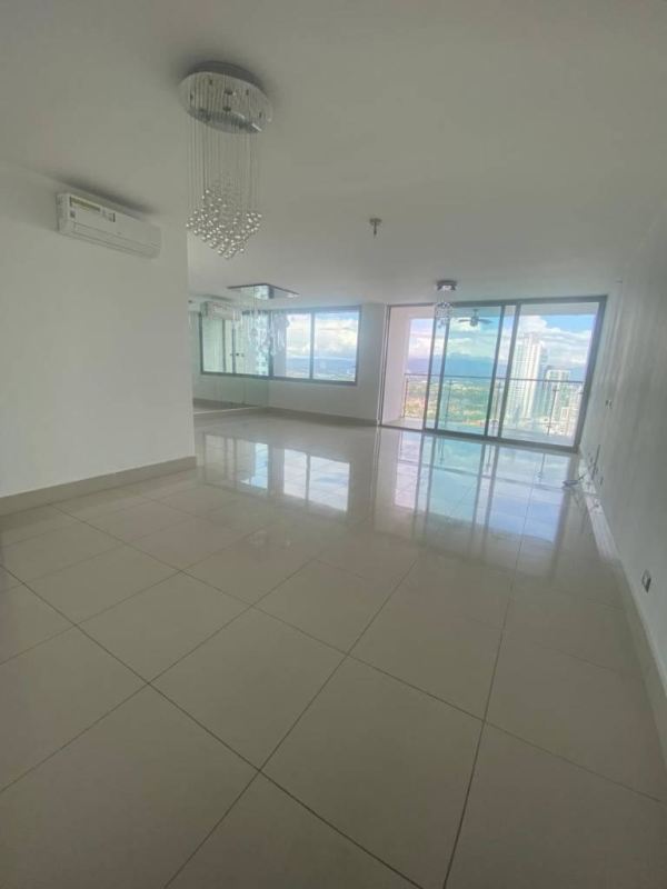 Modern living room with large windows, natural light, panoramic views Costa del Este Panama