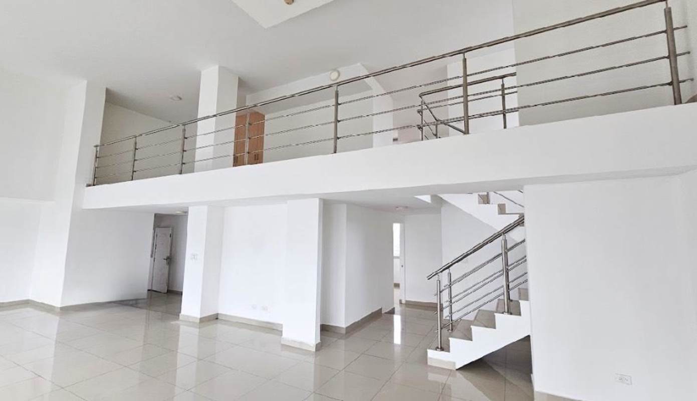 Spacious modern loft with double-height ceiling, large windows and mezzanine in Costa del Este Panama