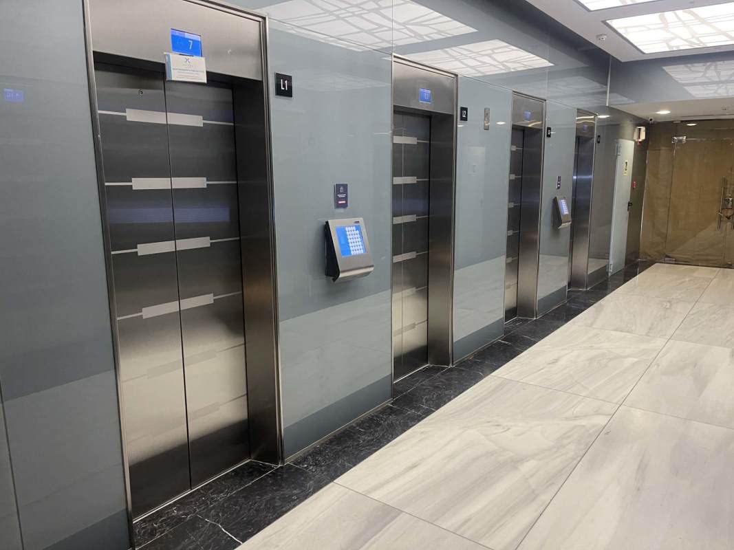 Modern elevator lobby with marble tile at Financial Park Tower Costa del Este Panama