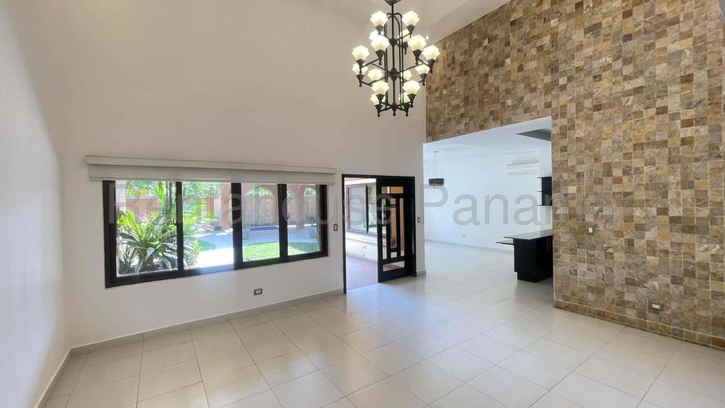 Large living area high ceiling multiple windows natural light Sunset Coast Costa Sur Panama