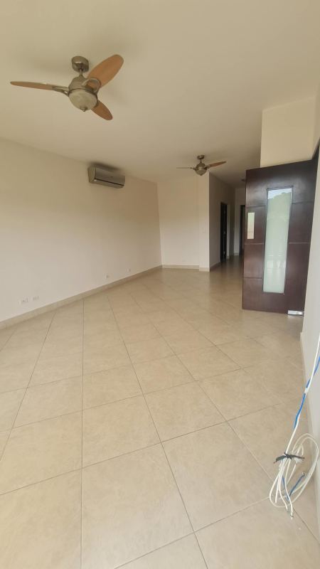 Living room with access to terrace in luxury condo at Embassy Club Clayton Panama City