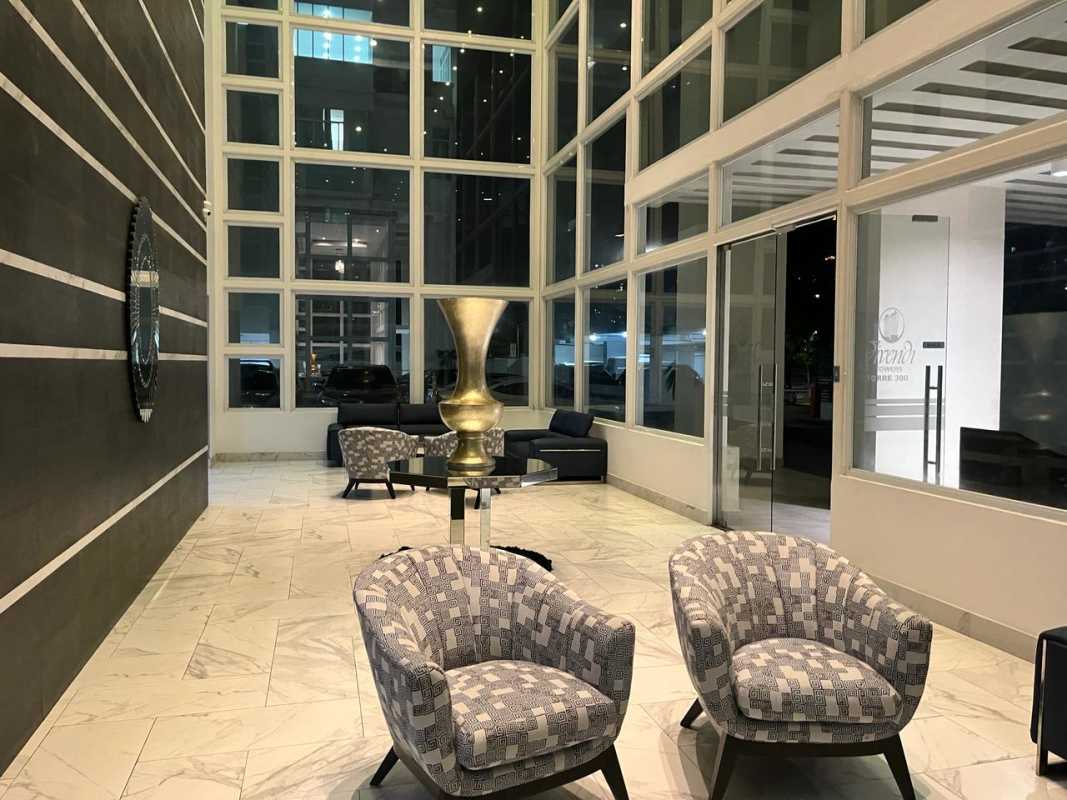 Lobby with floor-to-ceiling windows marble contemporary furniture Edison Park Panama