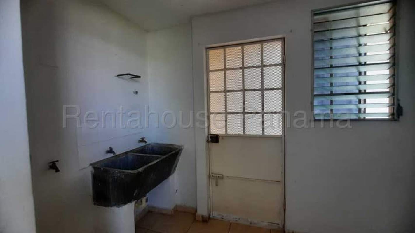 Spacious tiled living room with large window rental house Las Terrazas Brisas del Golf Panama