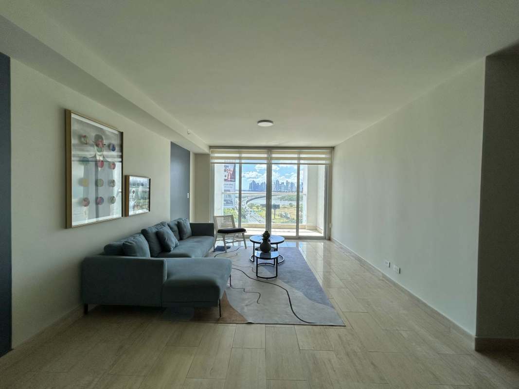 Modern dining space with large table and natural light PH The Regent Costa del Este Panama