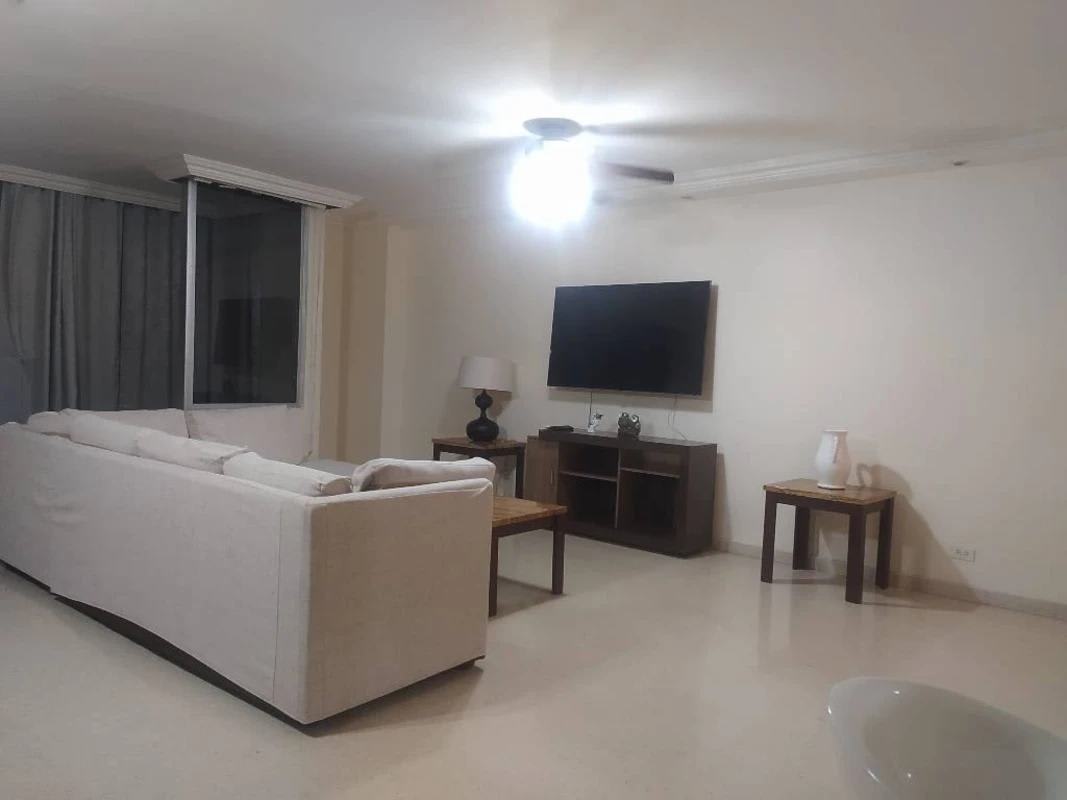 Living room with sofa TV and dining at PH Del Rey El Cangrejo Panama