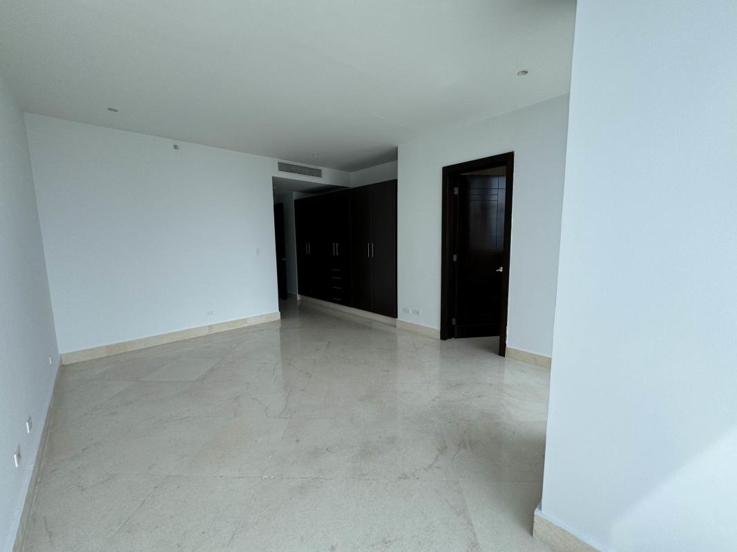 Modern bathroom with double sinks, marble tile, glass shower PH Pacific Point Punta Paitilla