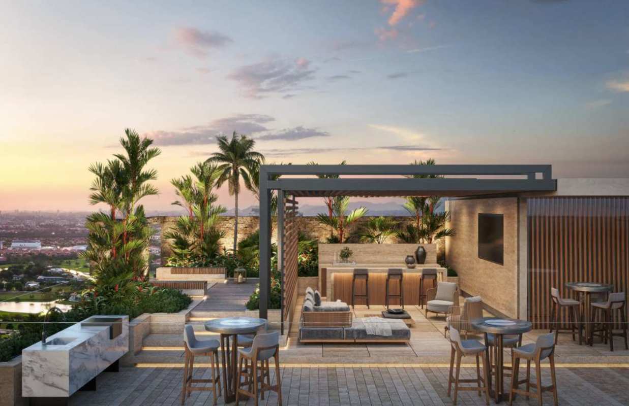 Contemporary lobby with wood paneling, lounge seating, and large windows at PH Corotú Santa María Panama