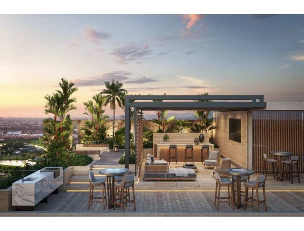 Infinity pool with private cabanas overlooking Panama City skyline at PH Corotú