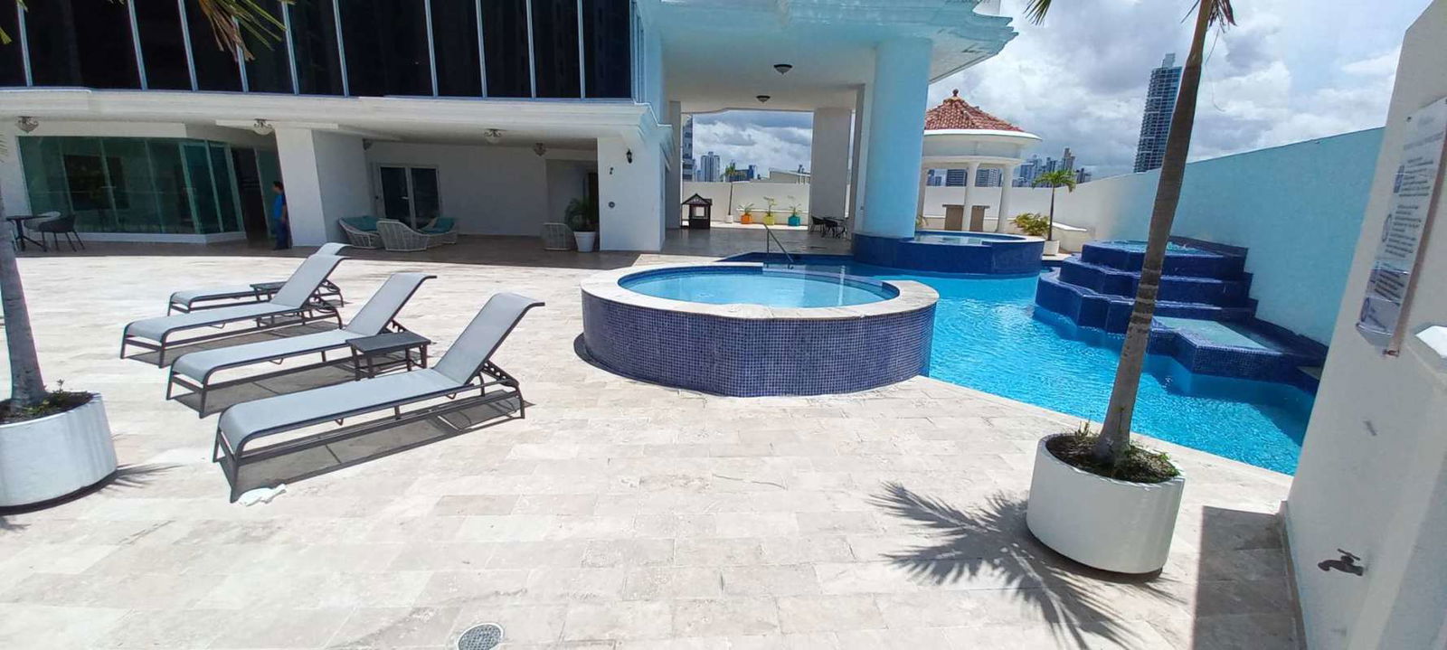 Luxury lobby with chandelier spiral staircase and elegant design in PH Ocean Drive, Punta Pacifica