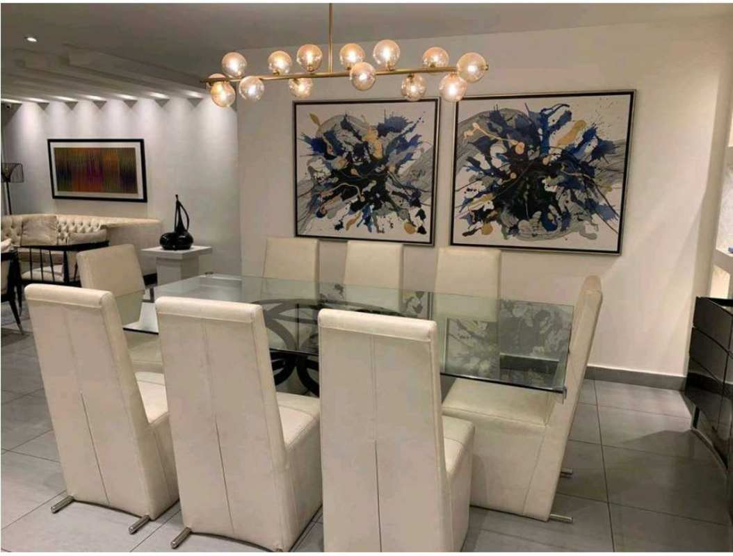 Modern dining room with glass table, chandelier in PH Mystic Point Punta Pacifica