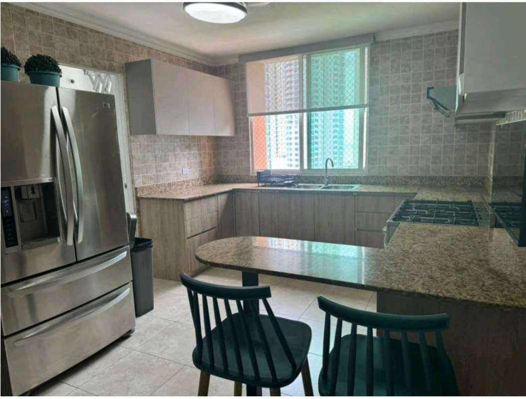 Kitchen with granite countertops, stainless appliances in PH Mystic Point
