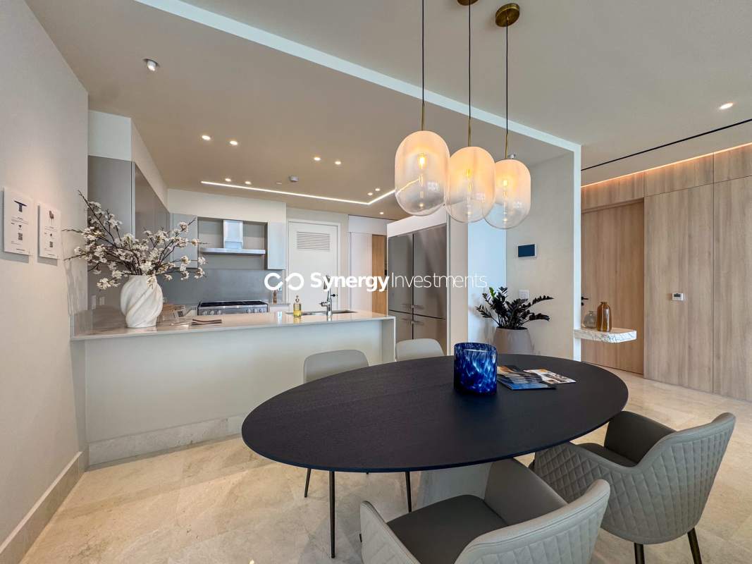 Gourmet kitchen with marble island and premium appliances in luxury condo Punta Pacífica Ocean Reef