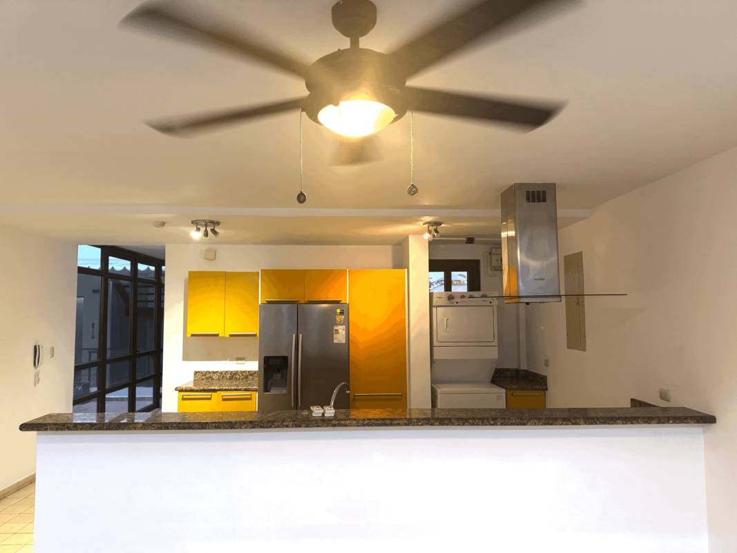 Split level living area wrought iron balconies colonial details Casa Ruigar Casco Viejo Panama