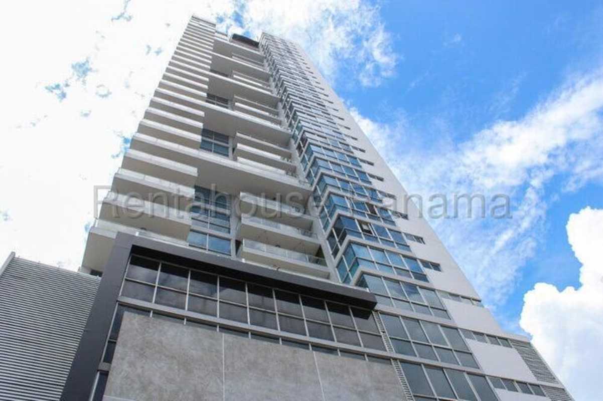 Facade of PH Vista Balboa tower with balconies and glass windows in Bella Vista district Panama