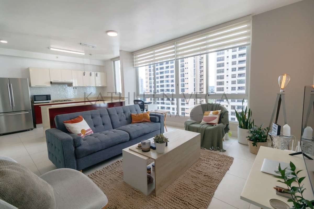 Modern kitchen with white cabinetry, island counter, pendant lighting in Castellammare Panama