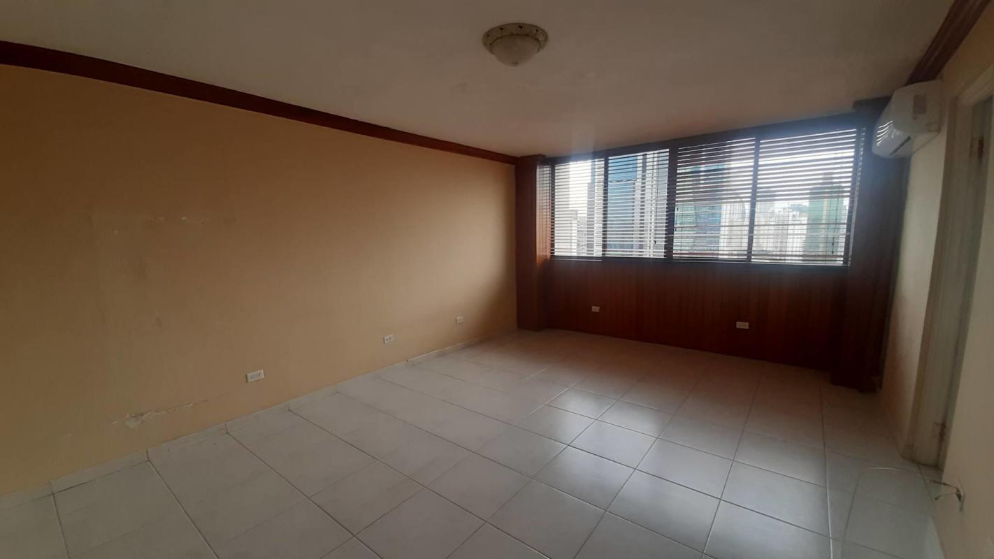 Modern bathroom with glass shower marble sink apartment Obarrio Tower