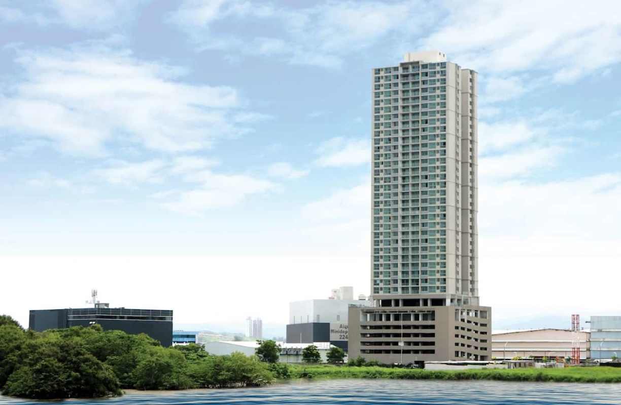 Modern gym with large windows, cardio machines and weights in PH Bali Costa del Este Panama City Panama