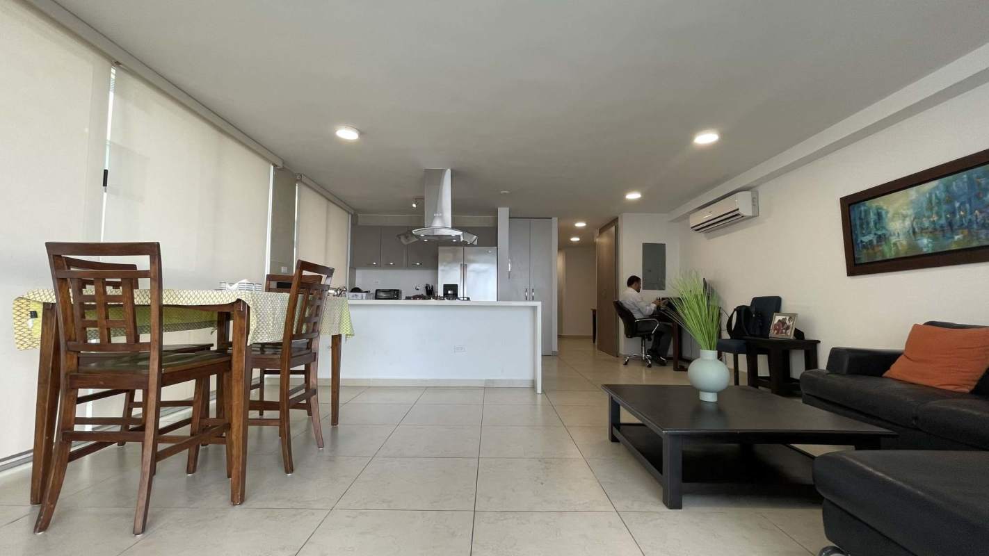 Modern living room with large windows, city ocean views PH Costa View Tower Costa del Este Panama