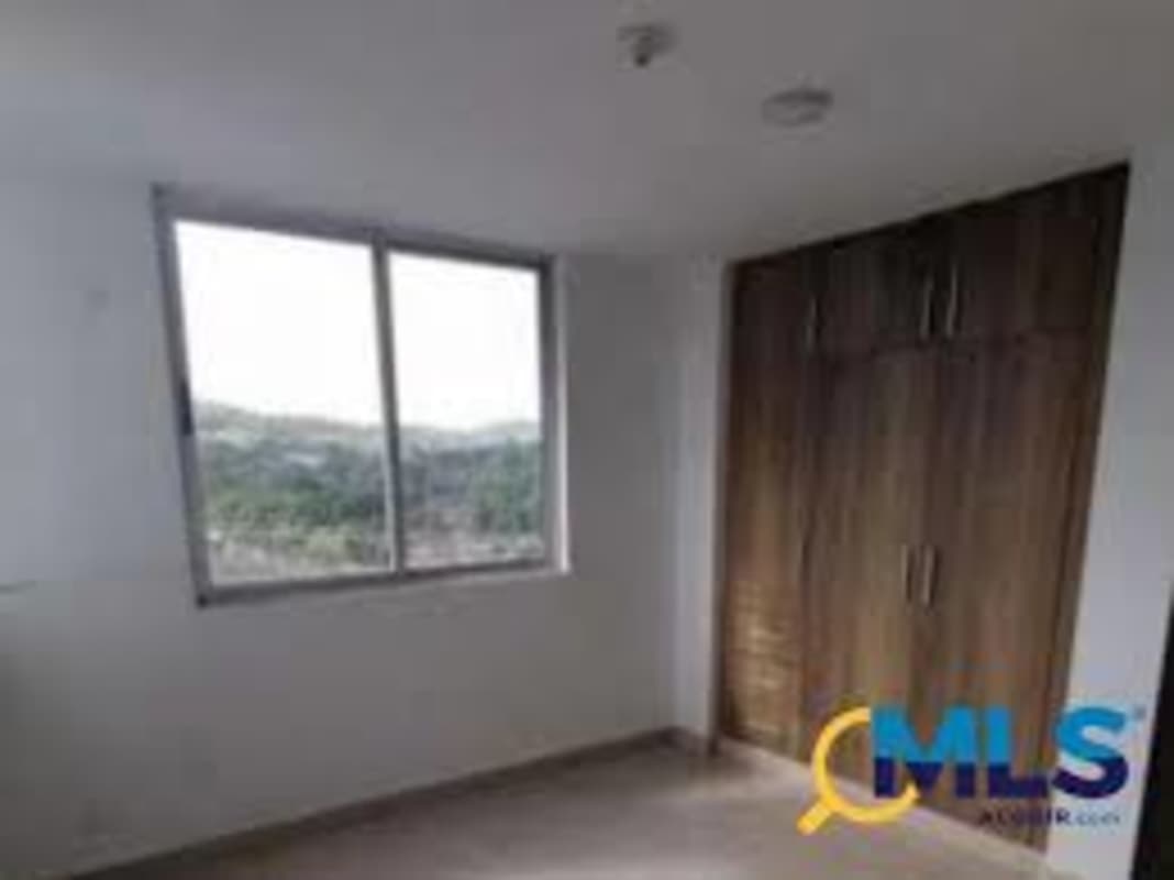 Kitchen with granite countertop, gas stove, stainless steel refrigerator in Panama City rental