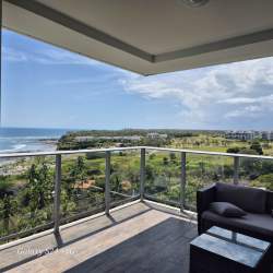 Spacious oceanfront balcony with glass railing in PH Rio Mar apartment Coronado Panama