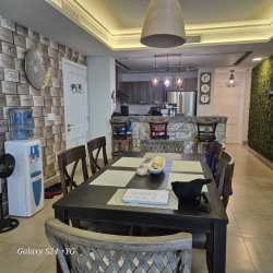 Spacious dining area connected to living room with ocean backdrop PH Rio Mar Panama