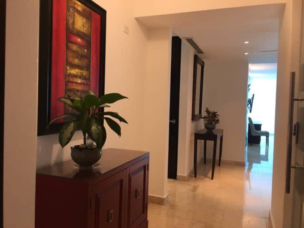 Contemporary kitchen with granite counters and stainless steel appliances PH Sky Panama City