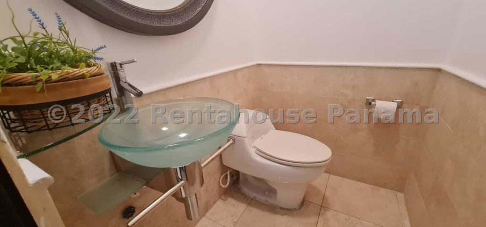 Modern bathroom with vessel sink marble countertop and glass shower PH Sky Panama