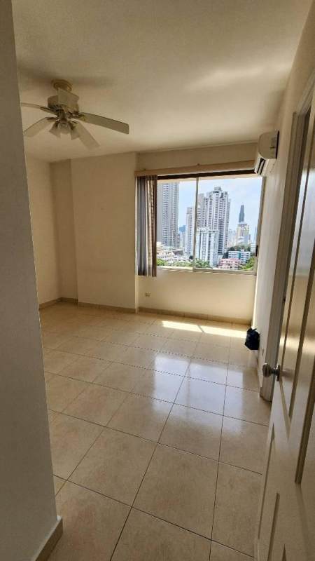 Traditional kitchen with granite countertops, dark wood cabinetry and stainless steel appliances in PH Terranova El Cangrejo Panama