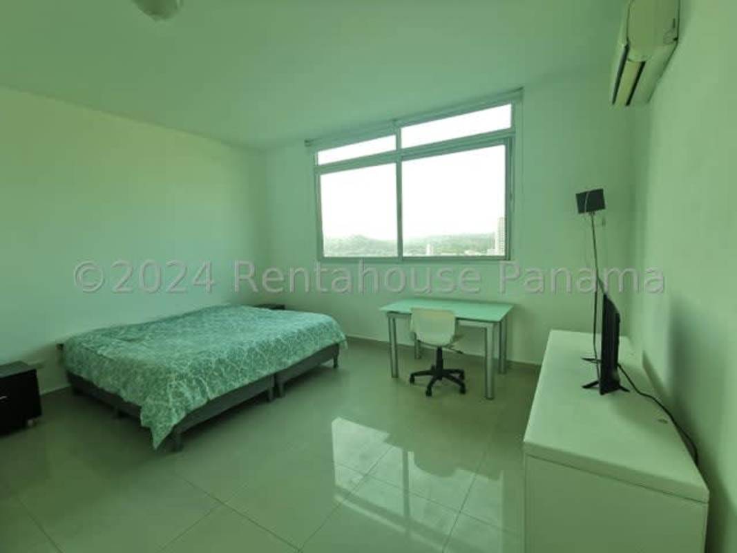 Contemporary bathroom with glass enclosed shower, vanity, and tile at PH Astoria El Cangrejo Panama apartment