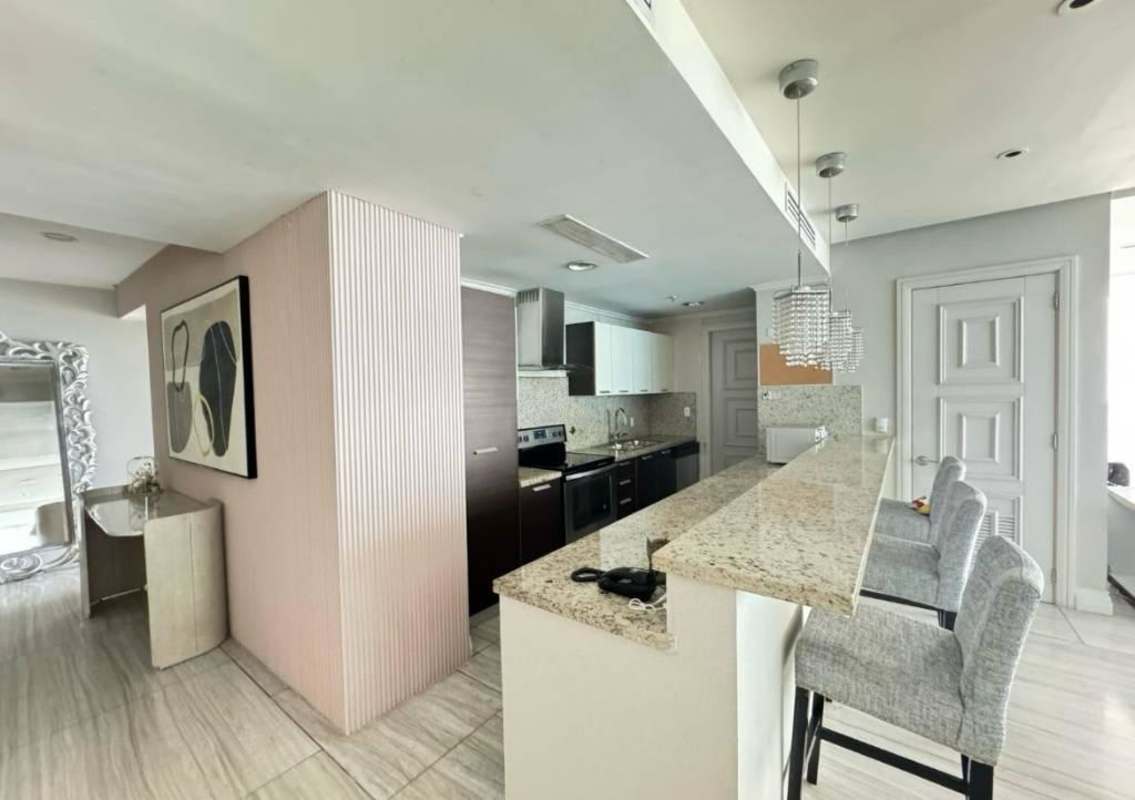 Modern bathroom with marble countertops and glass shower in PH Oceanaire Punta Pacifica condo