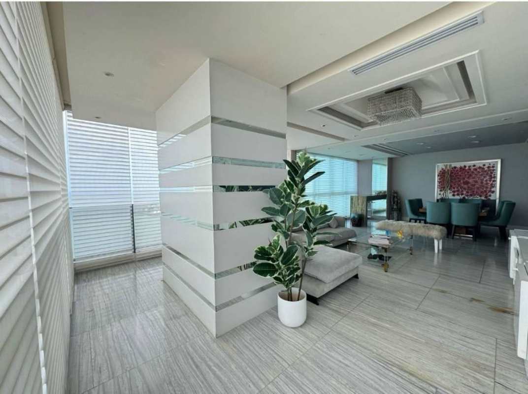 Luxury master bedroom with ocean view, floor-to-ceiling windows and modern design in PH Oceanaire Punta Pacifica