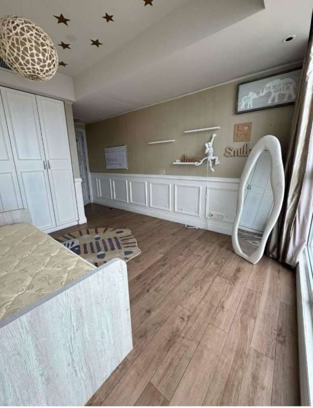 Second bedroom with city skyline view, ensuite bath, and modern finishes in PH Oceanaire