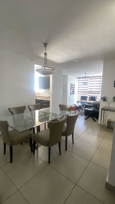 Spacious open plan living and dining room with natural light at PH Kings Park Panama City