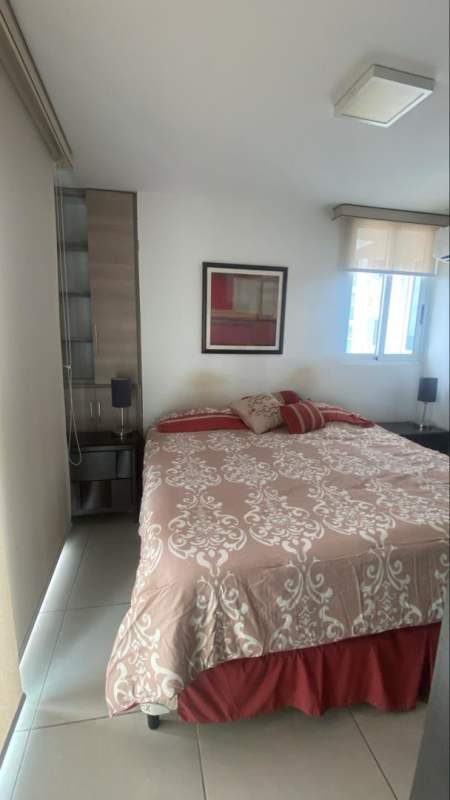 Main bedroom with large windows and built-in closets at PH Kings Park Condado del Rey Panama