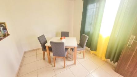 Bright dining space tiled floor curtains affordable Panama house for sale Vista Alegre