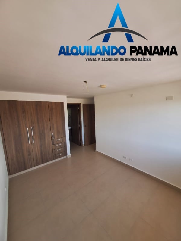 Modern bathroom with glass-enclosed shower, floating vanity at PH Spotlight Tower