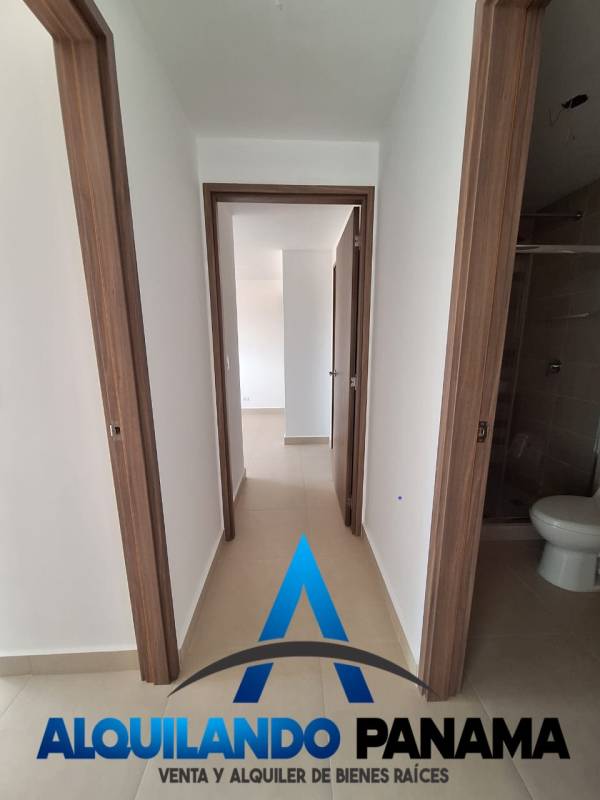 Second bedroom with ceramic floors and built-in closet in PH Spotlight Tower