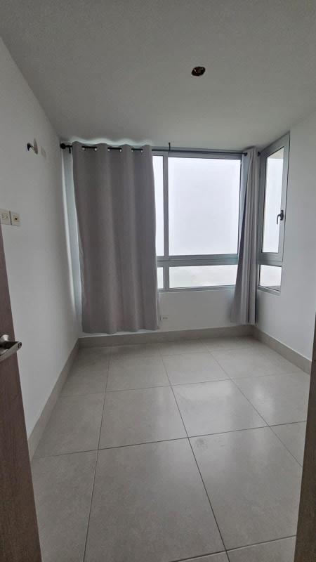 Open-concept living and dining room with ceramic tile floors at PH Greenwood Panama City