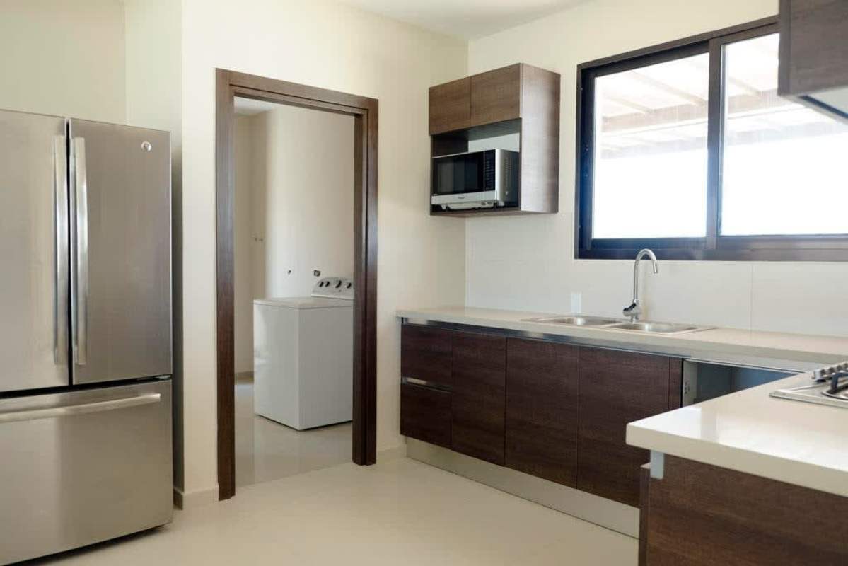 Spacious kitchen granite countertops modern cabinetry Costa Linda house