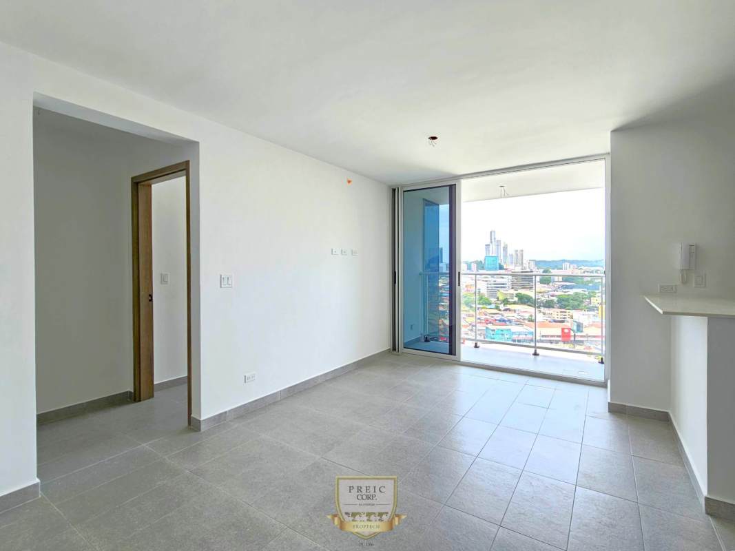 Unfurnished living area with large balcony window city views PH Park Square