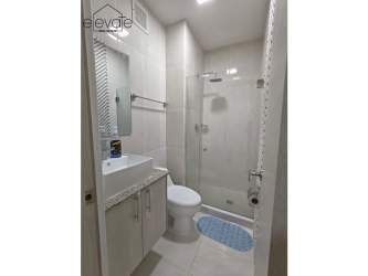 Open kitchen and dining space with modern appliances in PH Coral Park Playa Blanca Panama