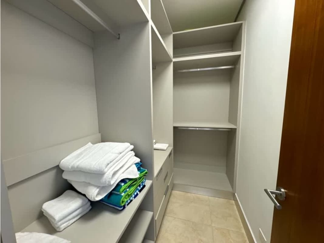 Modern gourmet kitchen in PH Matisse Costa del Este with granite counters and stainless appliances