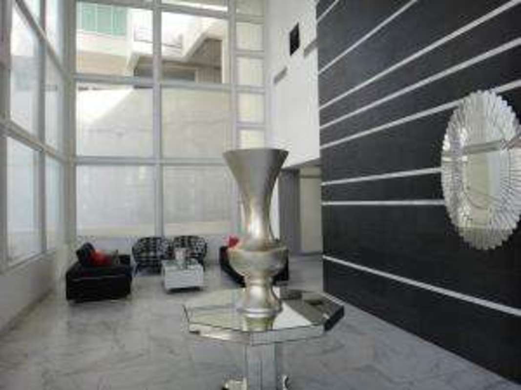 Double height lobby with marble floors and modern decor at PH Vivendi 300 Panama