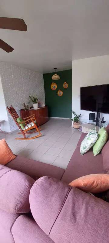Kitchen with dark wood cabinets granite countertop and gas stove PH Mallorca Park Gardens 2 Panama