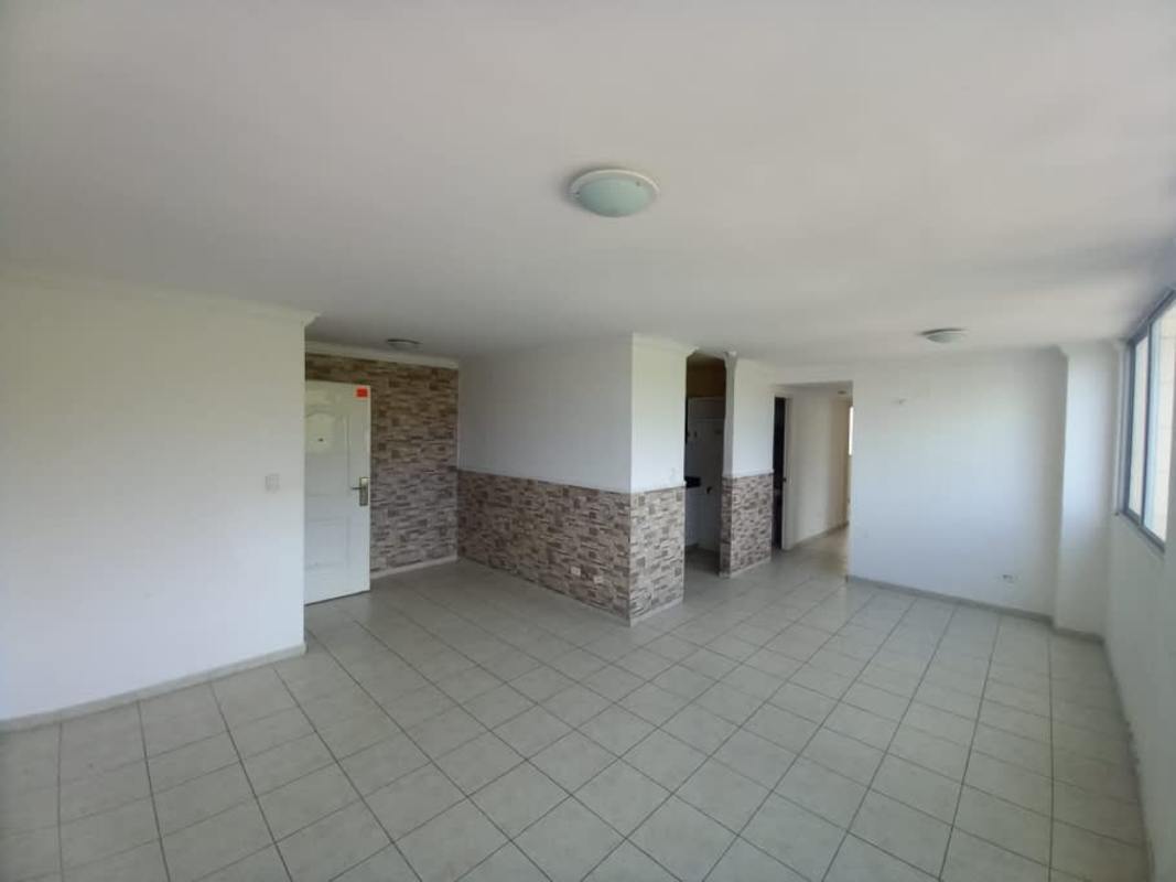 Bathroom with shower enclosure, tile walls, mirror and sink at PH Mallorca Park Gardens II
